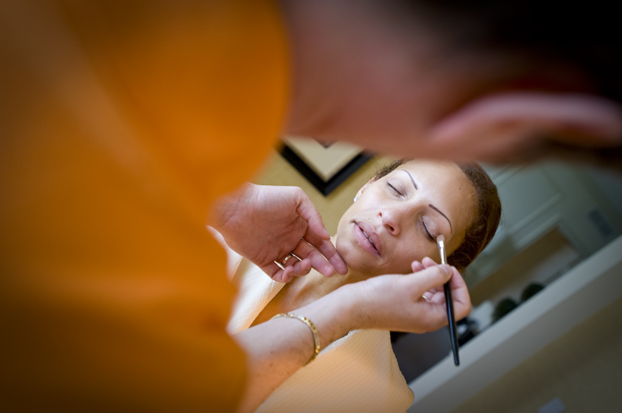 Bride having make up being done